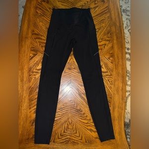 Lululemon leggings with back pocket zipper and side pockets, size 4